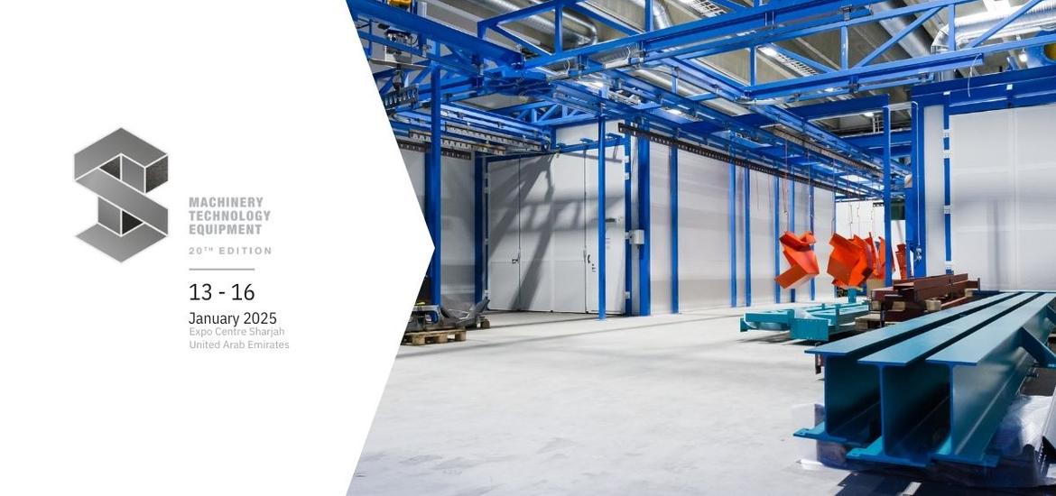 Industrial machinery and equipment setup in a large warehouse with blue steel framework and hanging red components. Text on the left side reads 'Machinery Technology Equipment, 20th Edition, 13 - 16 January 2025, Expo Centre Sharjah, United Arab Emirates.